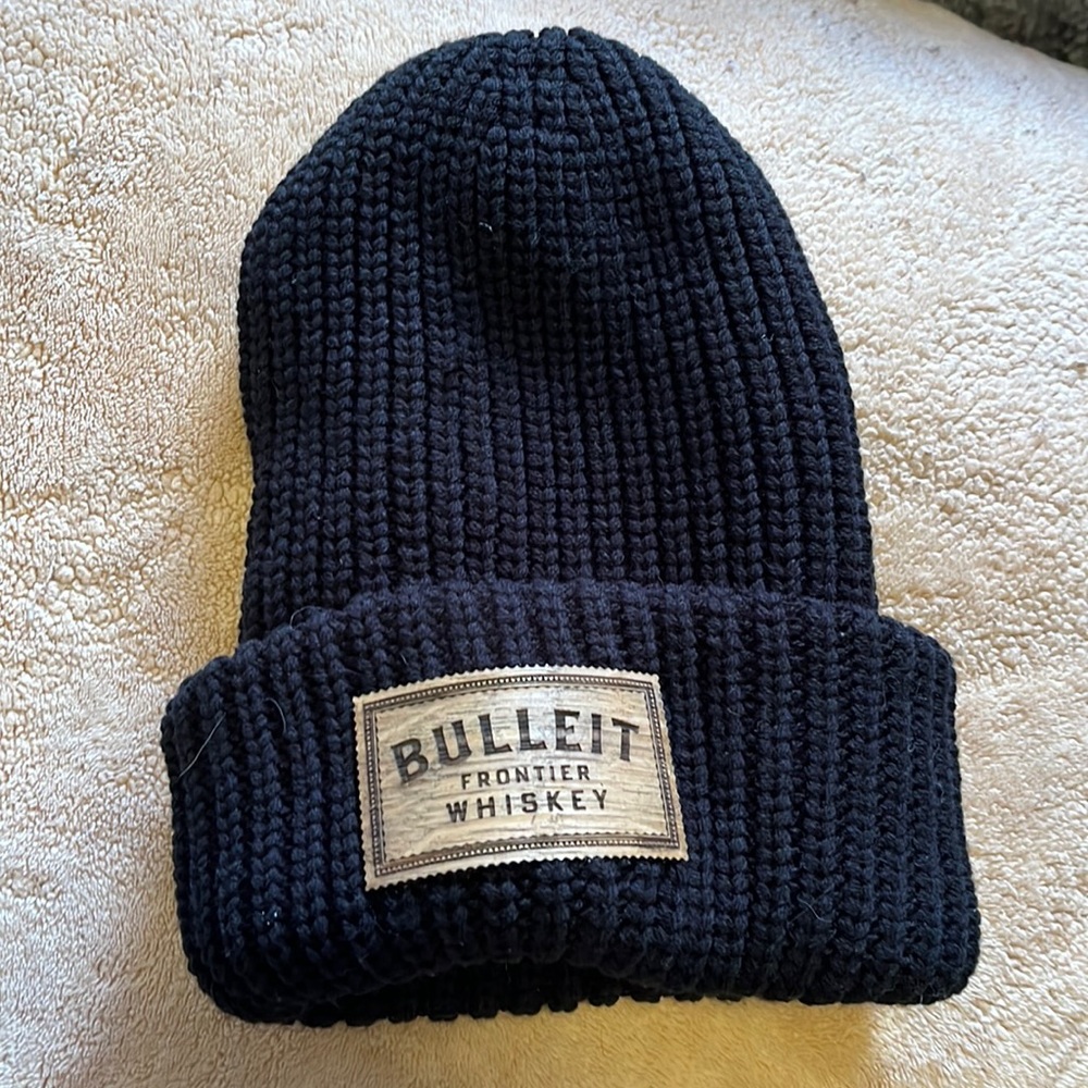 Bullet whiskey tossle cap